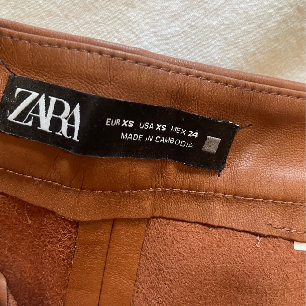 NWOT: 🤎 Zara Tan Brown Faux Leather Leggings Pants
Skinny Pants Size XS 📦 - Picture 11 of 12